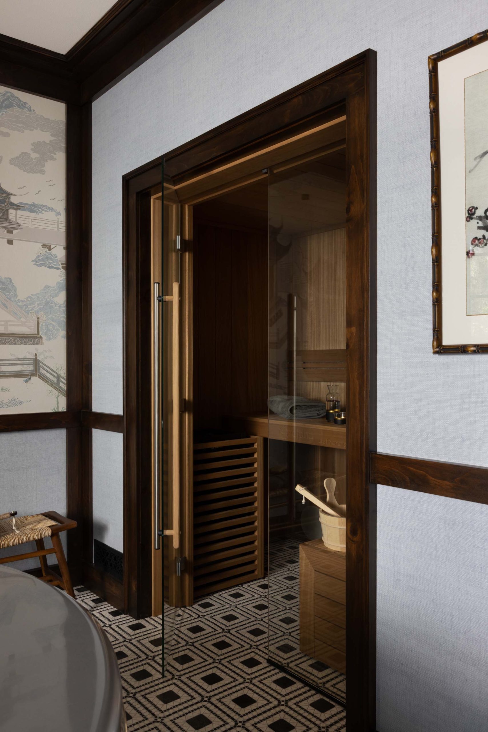 Cold plunge room with custom cedar sauna, Japanese-inspired millwork and marble mosaic tile