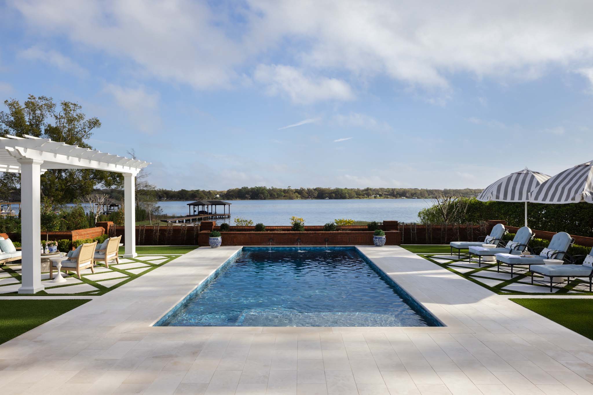 Luxury lakefront pool and outdoor living area