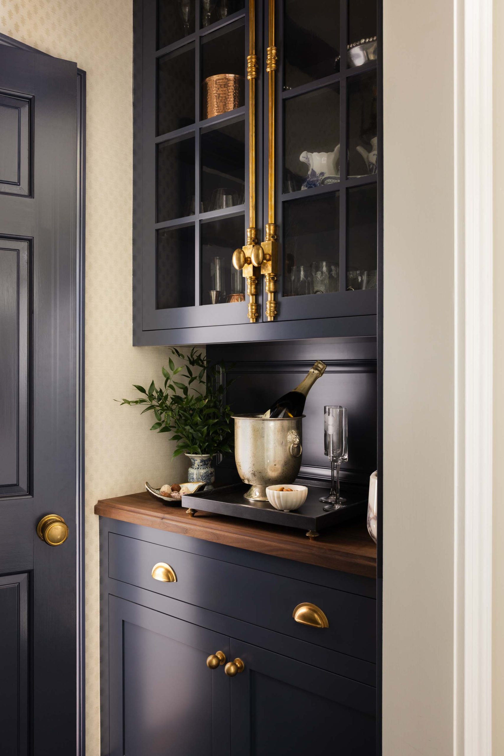 Butler's pantry cabinetry with Cremone bolts and brass hardware
