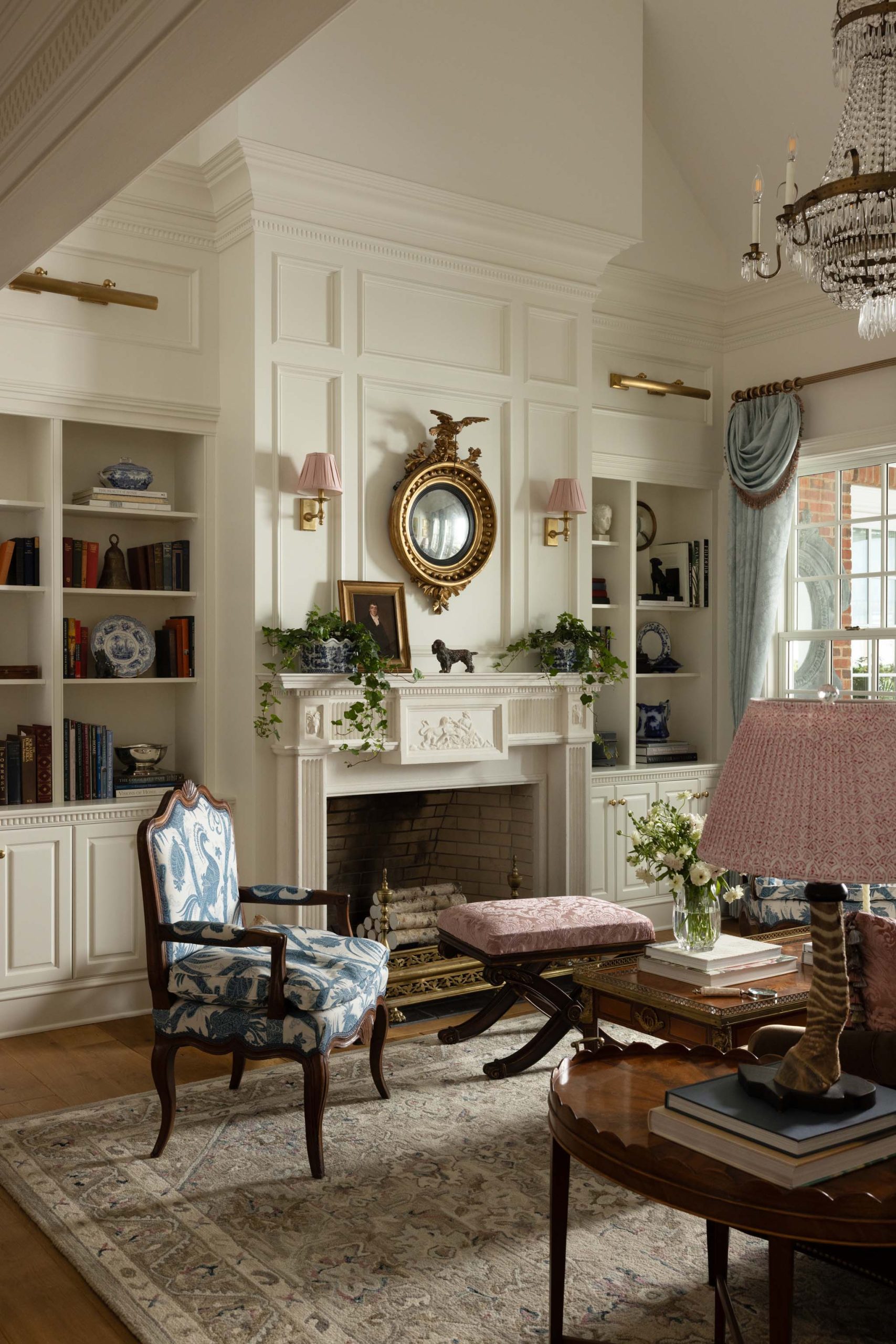 Traditional English country living room with custom built-in bookcases